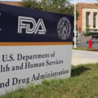 A sign on the FDA campus that says, "FDA: U.S. Department of Human Services, Food and Drug Administration"