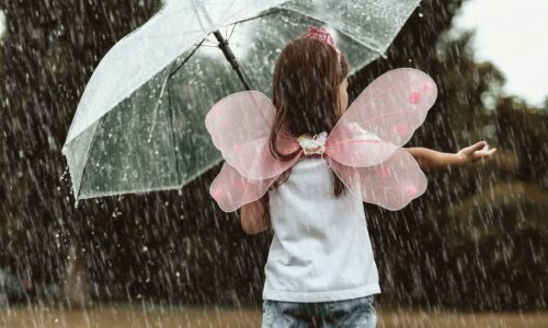 A little girl in the rain