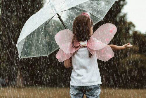 A little girl in the rain