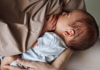 A mother breastfeeding her baby
